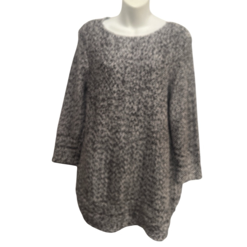 Chico’s sweater in a size large or 2.  Black and white
